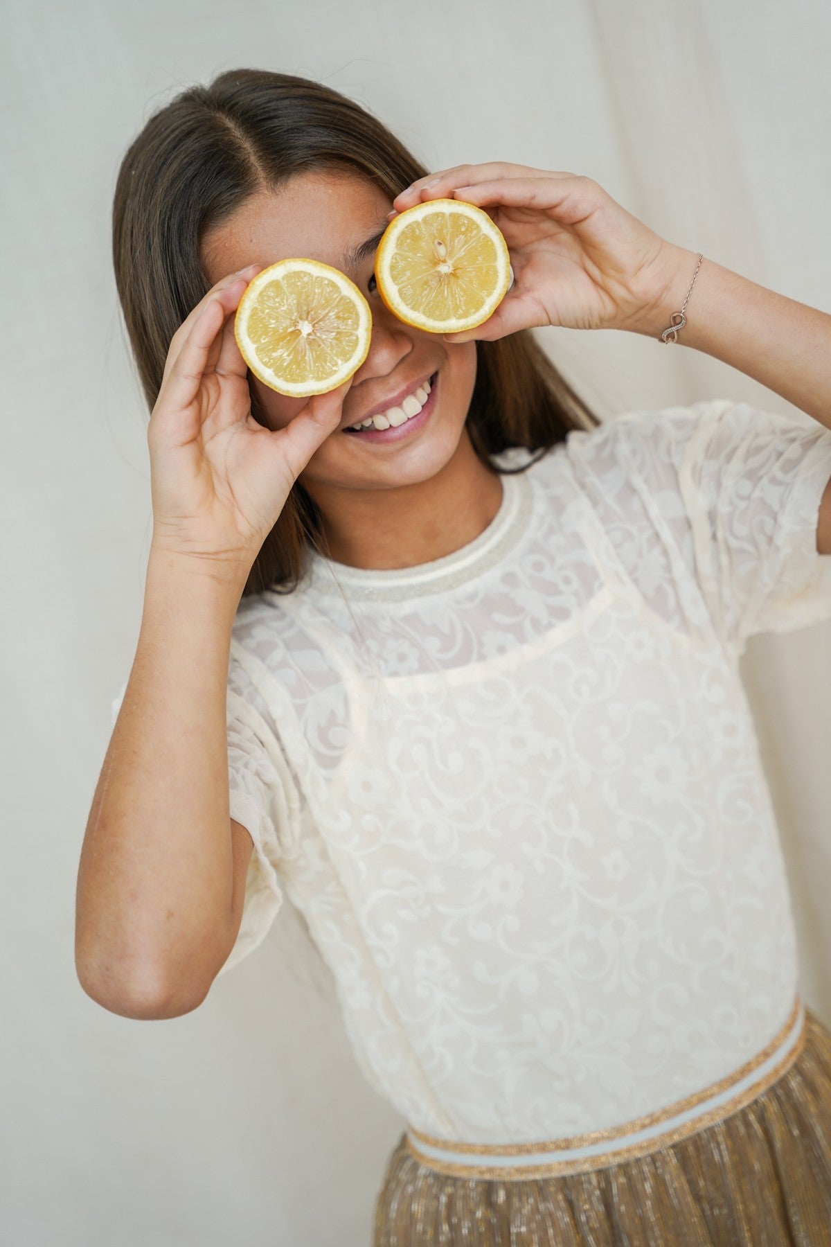 Evelijn Flo girls peplum mesh top