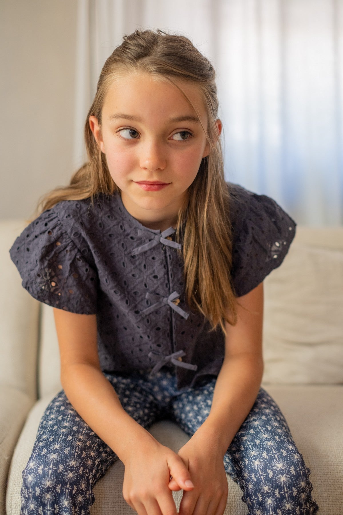 Charlotte Flo girls broderie anglaise blouse with fake bow closure