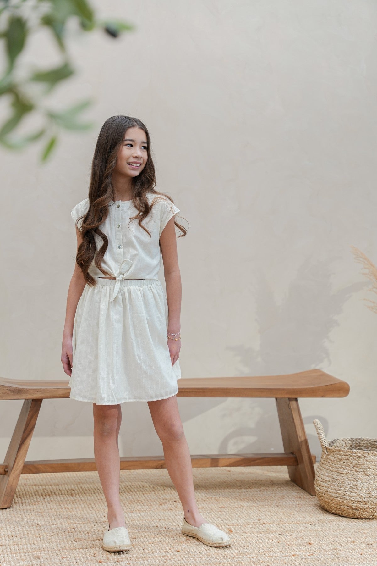 Maika Flo girls glitter dress with knot and button closure at front