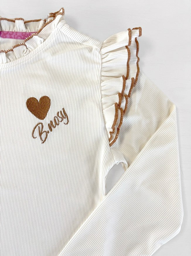 Tonya B.Nosy girls top wit ruffles ecru